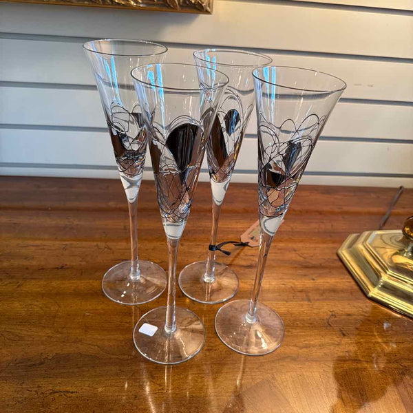 Four Champagne Glasses