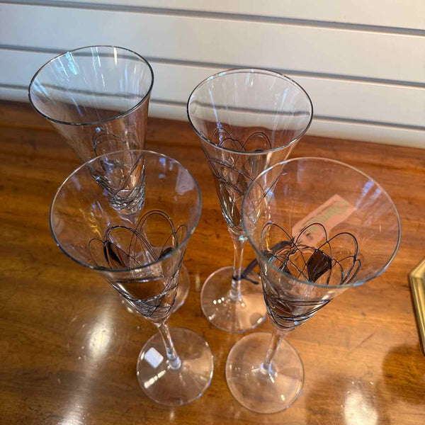 Four Champagne Glasses