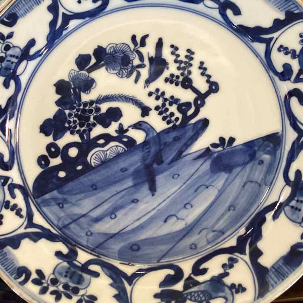 Set Of Four Blue And White Plates
