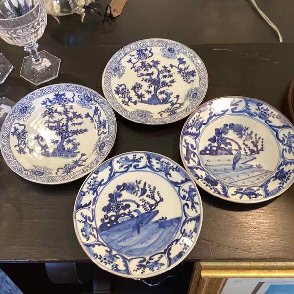 Set Of Four Blue And White Plates