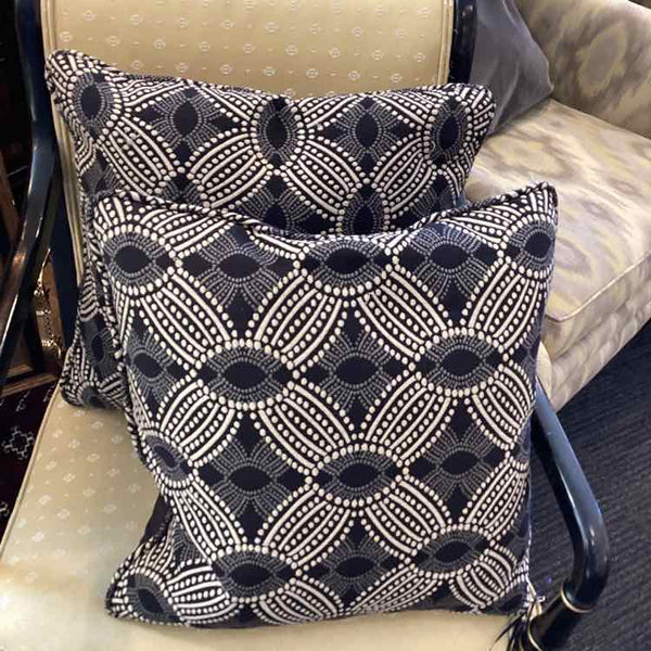 Two Black And Cream Pillows