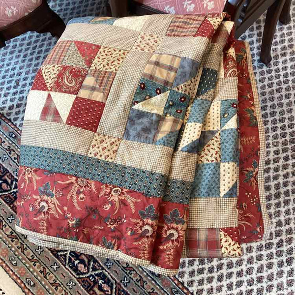 Red, Blue And Taupe Quilt