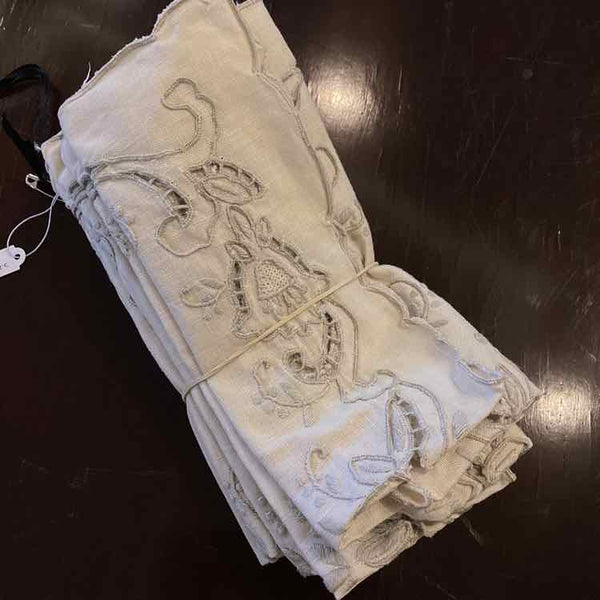 Eight Ivory Place Mats
