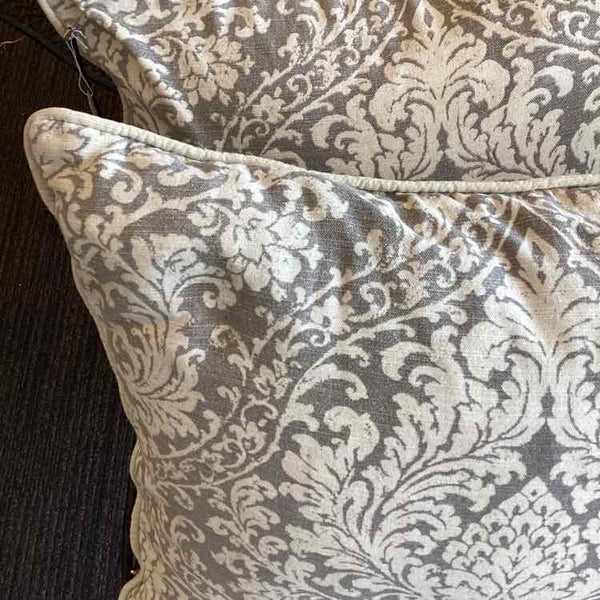 Pair Of Gray And White Pillows