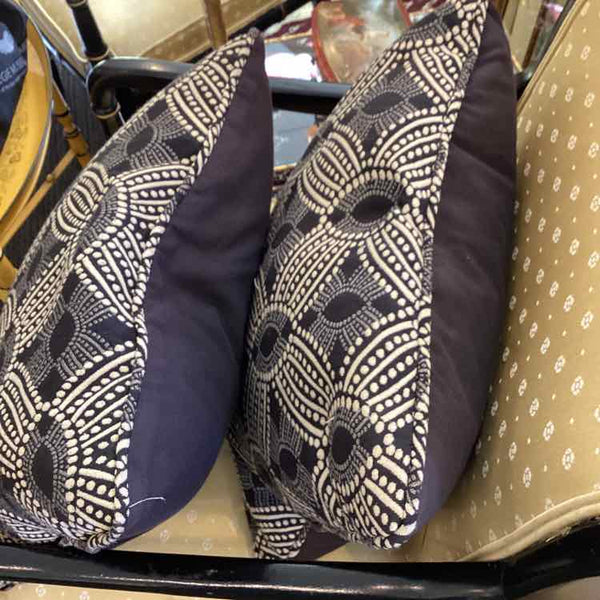 Two Black And Cream Pillows