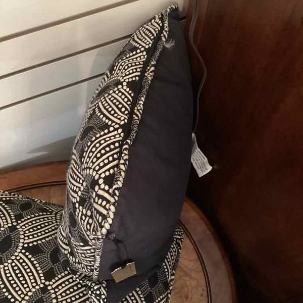 Two Black And Cream Pillows