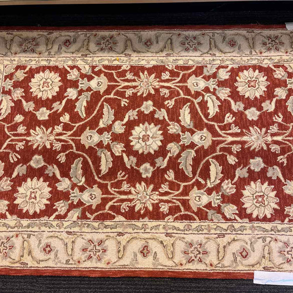 Rust And Cream Tufted Rug