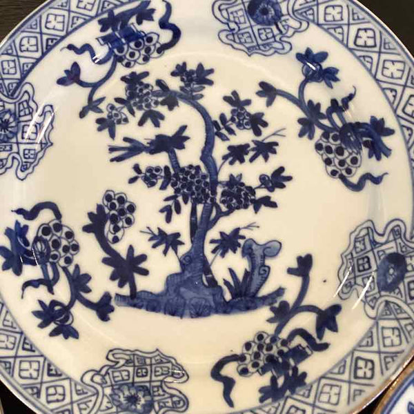 Set Of Four Blue And White Plates