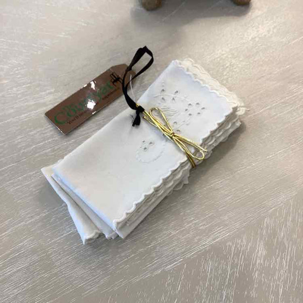 Six ivory Tea Napkins