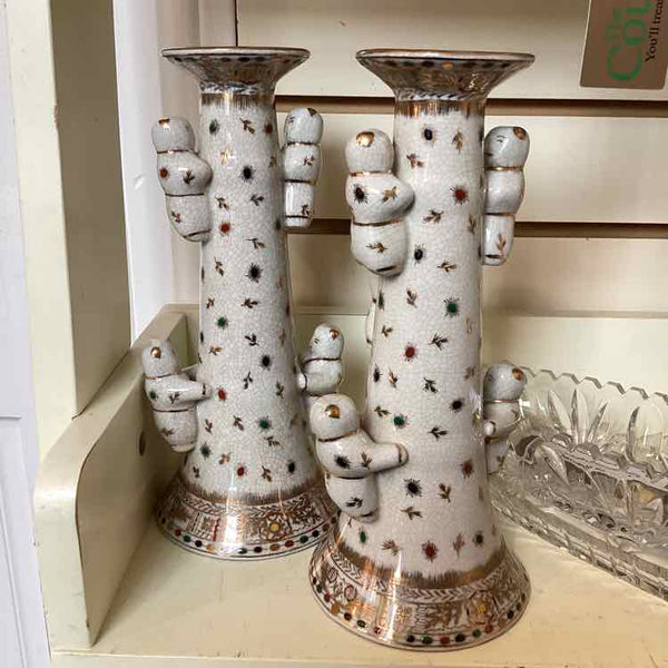 Pair Of Porcelain Candleholders With Five Boys