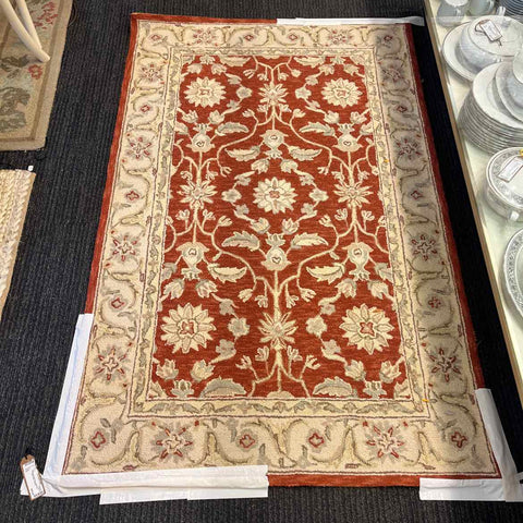 Rust And Cream Tufted Rug