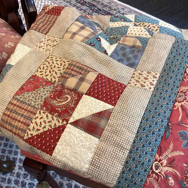 Red, Blue And Taupe Quilt