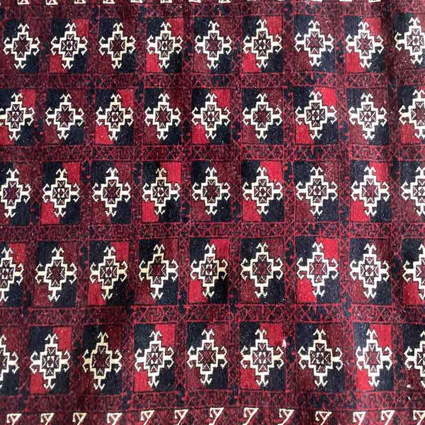 Black And Red Geometric Afghan Rug