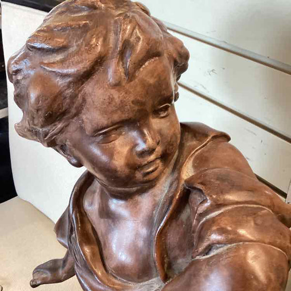 Pebble Thrower Resin Sculpture