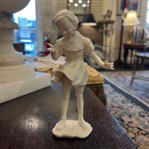 Girl With Butterfly Figurine