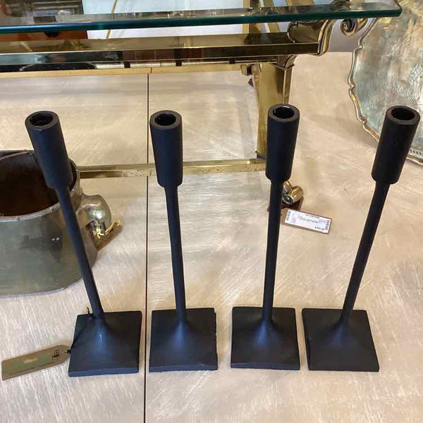 Four Black Metal Candlesticks