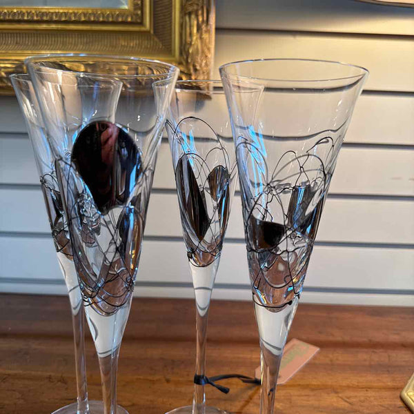 Four Champagne Glasses
