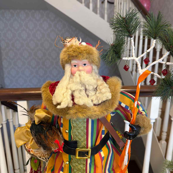 Santa Figure in Colorful Coat
