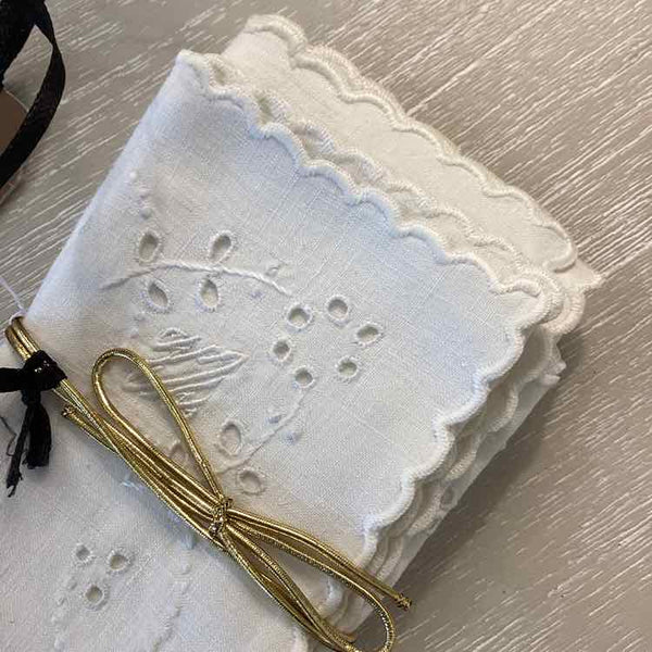 Six ivory Tea Napkins
