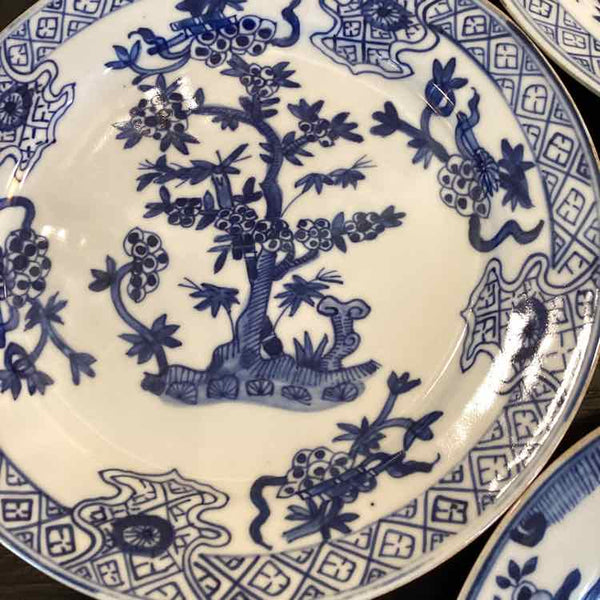 Set Of Four Blue And White Plates